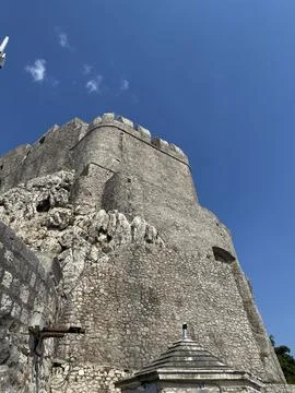 Low-angle shot of stone walls of Forte Mare fortress in Herceg Novi, Montenegro Stock Photos
