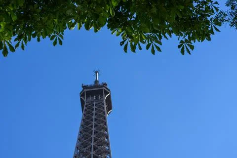 Low angle shot of the top of Eiffel Tower, Paris, France with blue clear sky and 스톡 사진