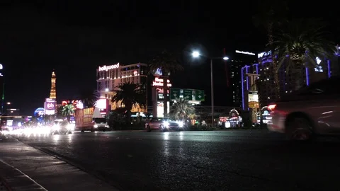 Low angle shot of traffic passing down the Las Vegas strip at night Stock Footage 106622166