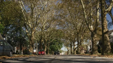 Low angle shot of truck driving down street. Video stock 102792126