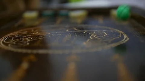 Low angle shot of two people playing an ancient game/Backgammon is Backgammon Stockbeeldmateriaal 85422623