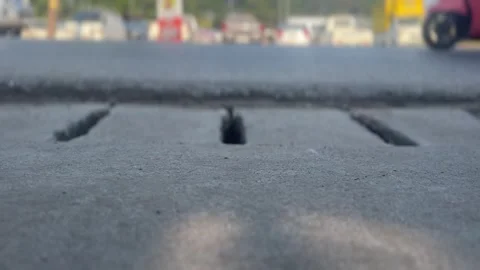 Low-angle shot of vehicles moving on a street Stock Footage 311502454