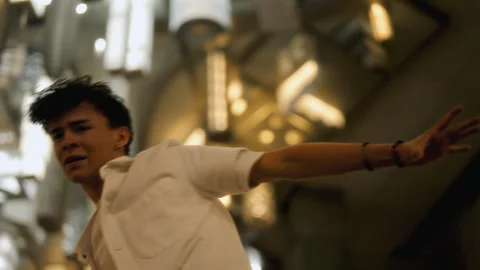 Low-Angle Shot Of A Young Man Performing A Freestyle Hip-Hop Routine Video stock 262993233