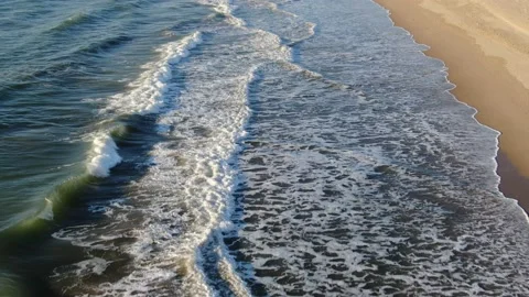 Low-angle shots with drone of the sea and Sabaudia Beach Circeo National Park Stock Footage 147677841
