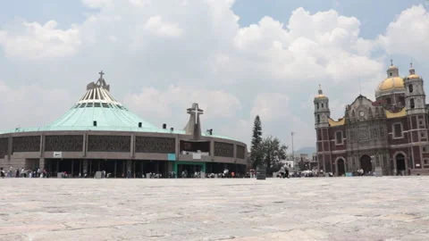 Low angle side shot of the Basilica of Guadalupe and the Expiatory Temple Video stock 159455918