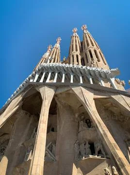Low angle side view of Passion Facade of the Sagrada Familia. Architect Antoni G Stock Photos