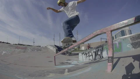 Low angle skateboard grind on rail Stock Footage 204929350