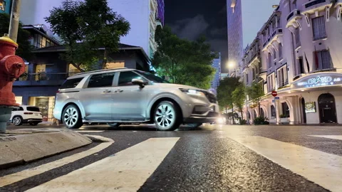 A low angle slider shot of Dong Khoi in Ho Chi Minh City, Vietnam, at night, Stock Footage 304880010