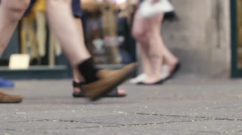 Low Angle Slow Motion Shot in a Shopping Street Видео 60577240