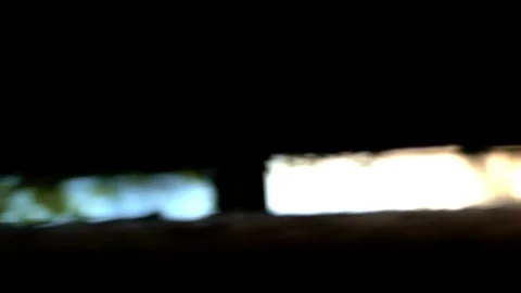 Low Angle Slow Pan Through Narrow Gap at Lakeside in Late Summer Stock Footage 346754702