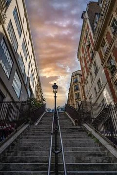 Low angle of a staircase between residential buildings in Montmartre, Paris, Fra Stock Photos