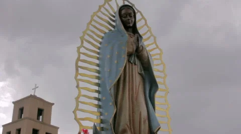 Low Angle of a Statue of the Virgin Guadalupe by a Mexican Catholic Church Stock Footage 64826477