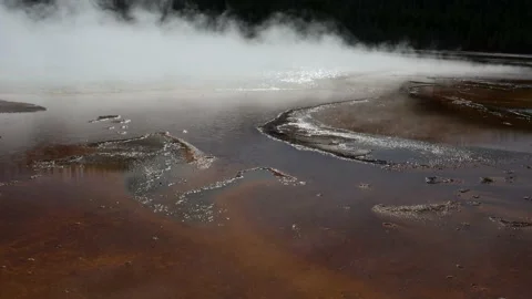 Low Angle-Steam rising over Grand Prismatic Spring Yellowstone Stock Footage 141670671