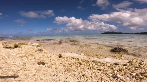 Low angle still view sandy rocky beach view of beautiful scene of Koromiri  isle Stock Footage 250401308