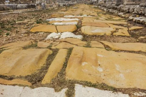 Low angle of stone ancient road or sidewalk in ancient city 스톡 사진