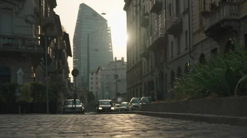 Low Angle Street View Of Car driving the street of Milan Stock Footage 254484676