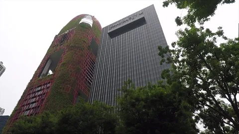 Low Angle, Street View, Green Building Covered With Plants, Downtown, Singapore Stock Footage 330076773