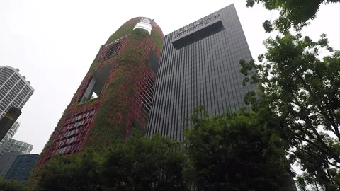Low Angle, Street View, Green Building Covered With Plants, Downtown, Singapore Stock Footage 330076854