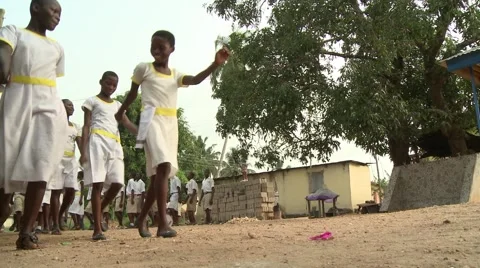 LOW ANGLE: STUDENTS MARCHING TO CLASS FROM MORNING ASSEMBLY Stock Footage 60626561
