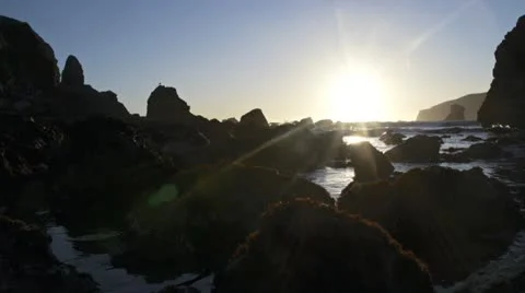 Low Angle Sunset Rocks Incoming Tide Oregon Coast Stock Footage 22097354