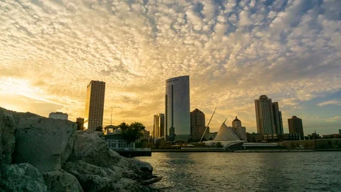 Low angle sunset time lapse of the city skyline In Milwaukee Stock Footage 98800539