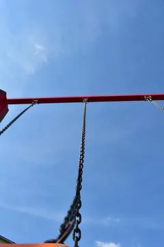 Low angle swing on a blue sky Stock Photos