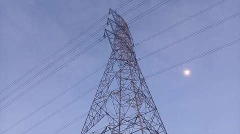 Low Angle Symmetrical Electricity Pylon and High Voltage Lines Stock Photos