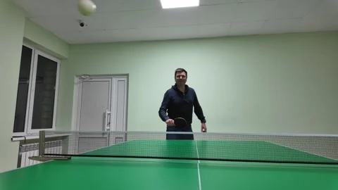 Low-Angle Table Tennis Gameplay: Real-Time Action Perspective from Below Stock Footage 299912839