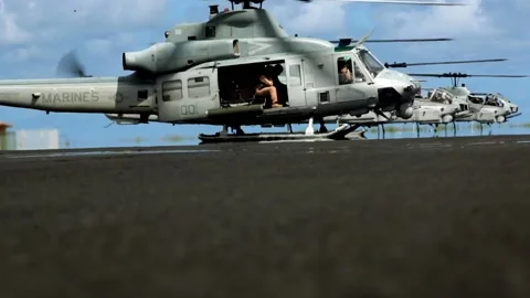 Low Angle of Three U.S. Marines Super Stallion Helicopters Stock Footage 130587793
