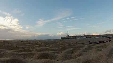 Low Angle of the Tide Coming in by the Harbour Stock Footage 56151096