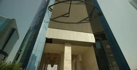 Low angle tilt up shot of a modern glass skyscraper. Stock-Footage 330239581