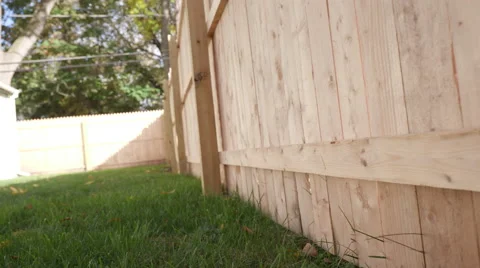 Low Angle Tilted Move Backward and Forward Side of New Fence Stock Footage 68778375