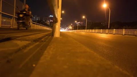 Low angle time lapse of a city road Video stock 138972820