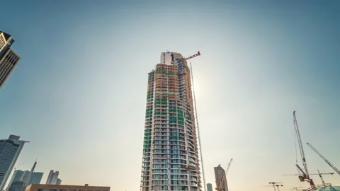 Low-Angle Time-lapse Of Modern Grand Tower Construction In Frankfurt Modern City Stock Footage 142208281