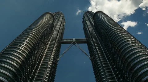 A low angle Time-lapse of the Petronas Towers in Kuala Lumpur Stock Footage 58496221