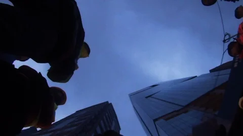 Low angle time lapse of workmen talking. Stock Footage