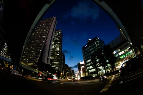 Low angle Timelapse of city streets with people and cars during night, Tokyo Stock Footage 136116529