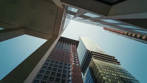 Low-Angle Timelapse Of Modern Omnni Tower Skyscrapers In Frankfurt Business City Stock Footage 142206523