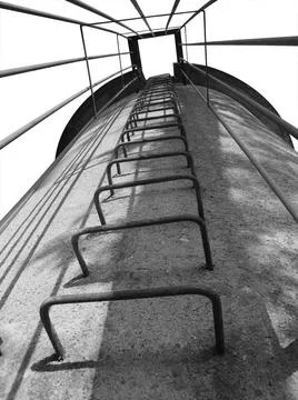 Low angle tower low angle black and white shot of a old tower with metalli... Stock Photos