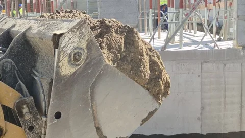 Low Angle Tracking Shot of Large Earthmover Carrying Soil 库存影片 332729206