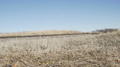  Low Angle Train Moving Away from Camera Stock-Footage 92437786