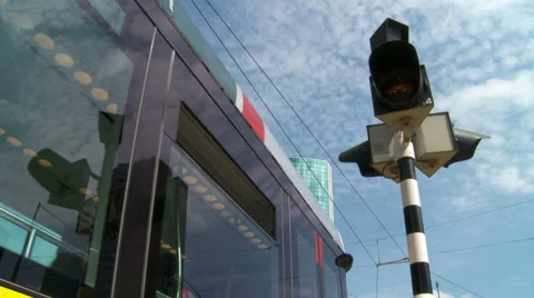 Low angle tripod shot of tram passing. Renewable energy in green city Stock Footage 42491007