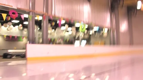 Low angle as TXRG skaters skate around the track 2000's Video stock 235417519