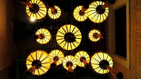 Low-angle under group of ancient Chinese lanterns with warm light hanging i.. Stock Footage 345035332