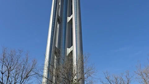 Low angle upward pan of the distinctive five-towered Olympic Park Observation Stock Footage 331594929