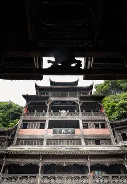 Low-angle vertical shot looking up at a grand multi-story traditional build.. Stock Photos