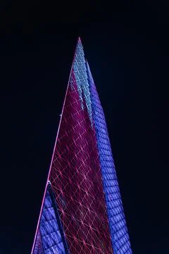 Low Angle Vertical View of Al Mana Tower Displaying Qatari Flag Pattern Photos