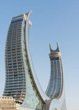 Low Angle Vertical View of Katara Towers Iconic Crescent Architecture in Lusail Stockfoto's