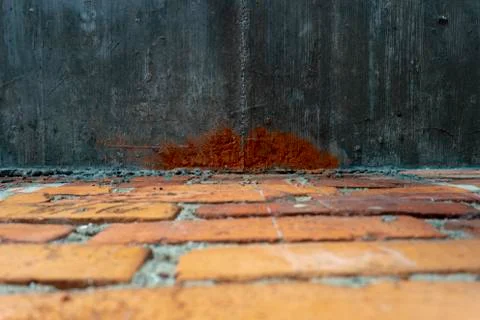Low angle view across brick paving to a wall Foto stock