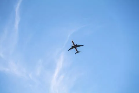 Low angle view of airplane against the sky with space for text Stock Photos